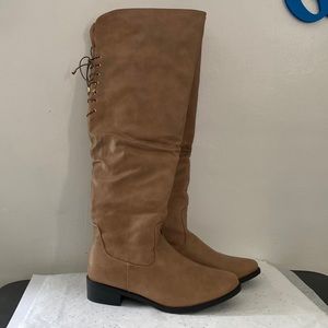 Tan size 10 over the knee boot.